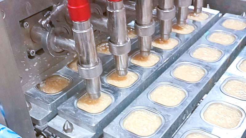 The tray filling and sealing machine is intelligently controlled via a PLC (Programmable Logic Controller) and a touchscreen.