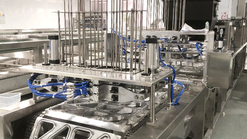 The box filling sealing machine is intelligently controlled via a PLC (Programmable Logic Controller) and a touchscreen.
